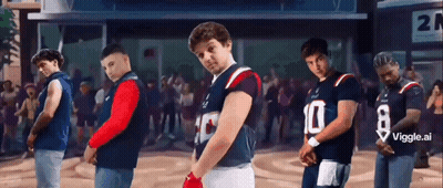 Young Men In Football Uniforms Number 10 In Front Of Crowd GIF