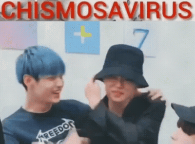 Young Men In Hats Laughing Together GIF