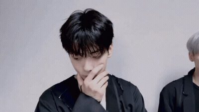 Young Men In Military Uniforms Standing Together GIF
