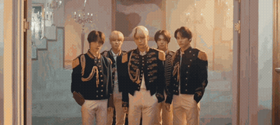 Young Men In Military Uniforms Standing Together GIF