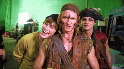 Young Men In Pirate Costumes Posing GIF