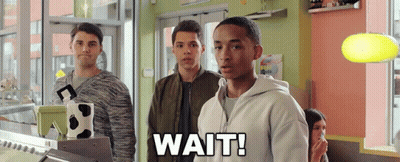 Young Men In Store Saying Wait GIF
