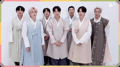 Young Men In Traditional Korean Clothes Posing GIF