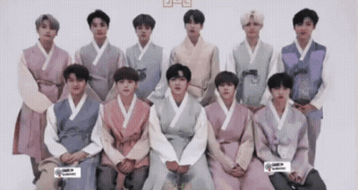 Young Men In Traditional Korean Clothing Posing GIF