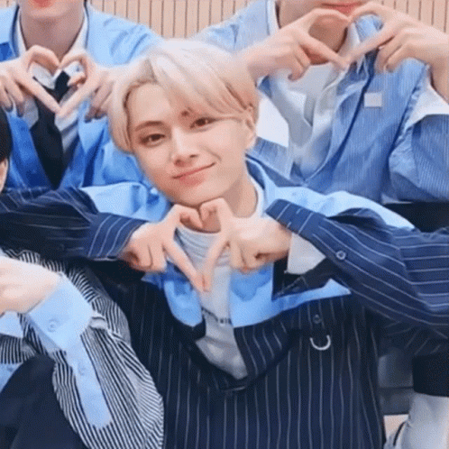 Young Men Making Heart Shape With Fingers GIF