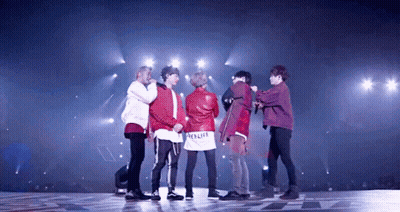 Young Men On Stage With Red Relife Jacket GIF