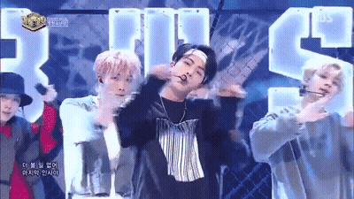 Young Men Performing On Stage In Front Of BS Logo GIF