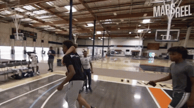Young Men Playing Basketball GIF