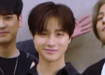 Young Men Posing For Picture With Funny Face GIF