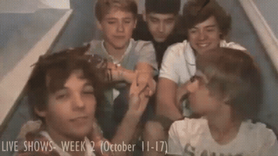 Young Men Posing In Photo Booth October 11-17 GIF