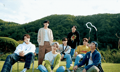 Young Men Posing In Yellow Love Shirt GIF