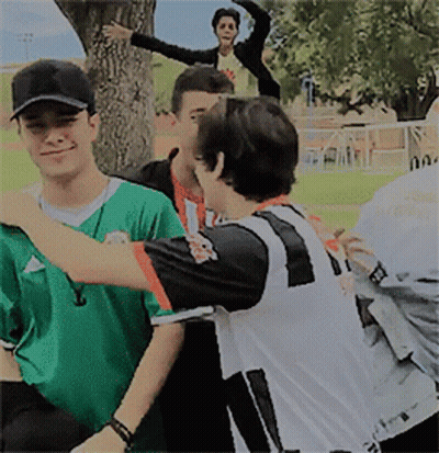 Young Men Posing With Adidas Jersey GIF