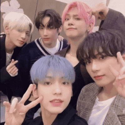 Young Men Posing With Peace Sign GIF