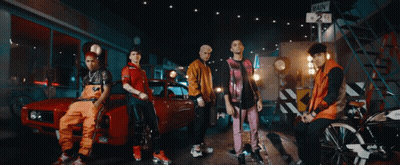 Young Men Posing With Red Car GIF