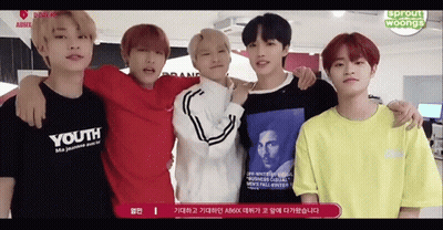 Young Men Posing With Youth Shirt GIF