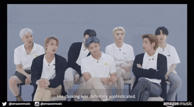 Young Men Sitting And Talking On A Couch GIF