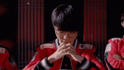 Young Men Sitting At Table With Man In T1 Shirt GIF