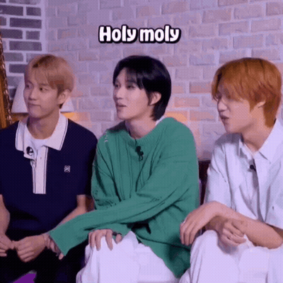 Young Men Sitting Next To Each Other GIF