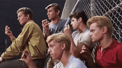 Young Men Sitting On A Fence GIF