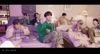 Young Men Sitting On Beds Giant Dad Sweater GIF