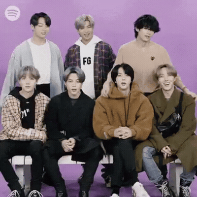 Young Men Sitting On Bench GIF