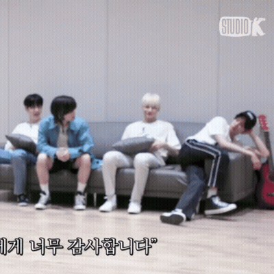 Young Men Sitting On Couch With Guitar GIF