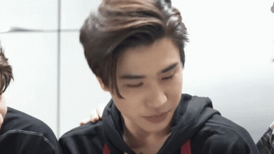 Young Men Sitting Together GIF