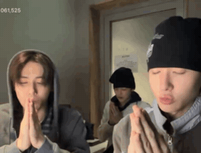 Young Men Sitting With Eyes Closed In Prayer GIF
