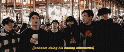 Young Men Standing In Front Of Crowd GIF