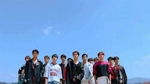 Young Men Standing In Line GIF