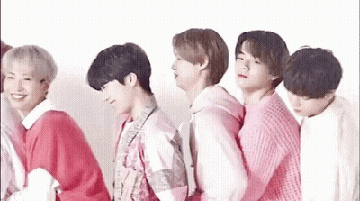 Young Men Standing In Row GIF