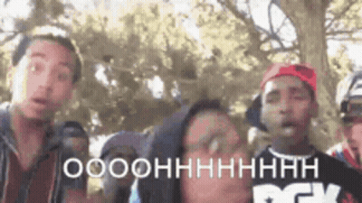 Young Men Standing Next To Each Other GIF