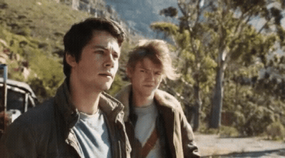 Young Men Standing On Road GIF
