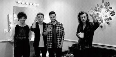 Young Men Standing Together GIF
