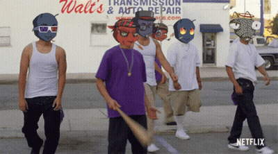 Young Men Walking In Front Of Walt's Transmission & Auto Repair Store GIF