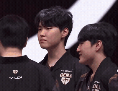 Young Men Wearing Black Gen.g Shirts GIF