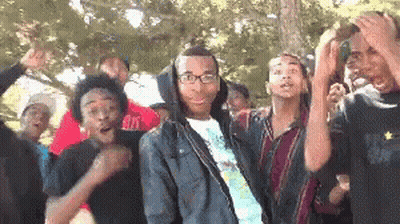 Young People Dancing In Park GIF