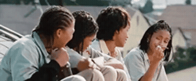Young People Sitting On Rooftop GIF
