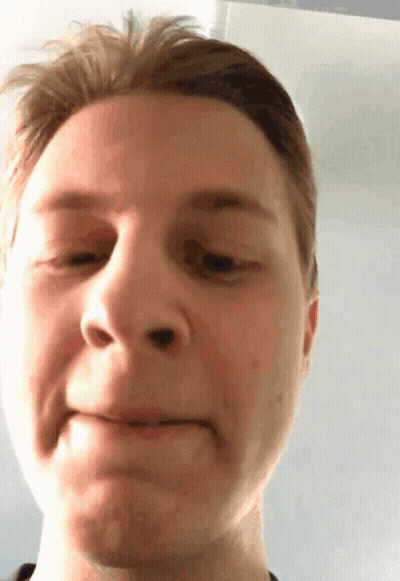 Young Woman Making Funny Face In Front Of TLC Logo GIF