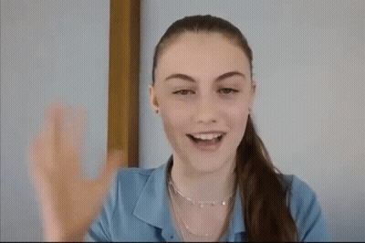 Young Woman Making Funny Face With Tongue Out GIF