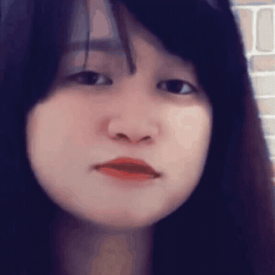 Young Woman Serious Close Up GIF