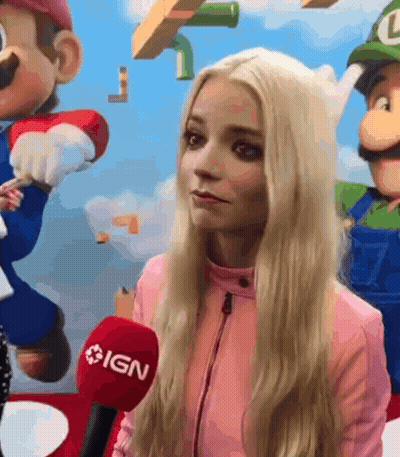 Young Woman Singing Into Microphone GIF
