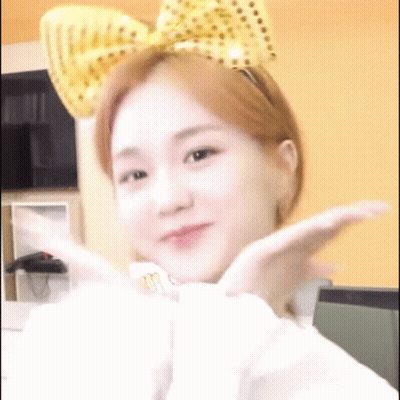 Young Woman With Yellow Bow GIF