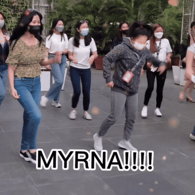 Young Women In Face Masks Dancing Saying Myrna GIF