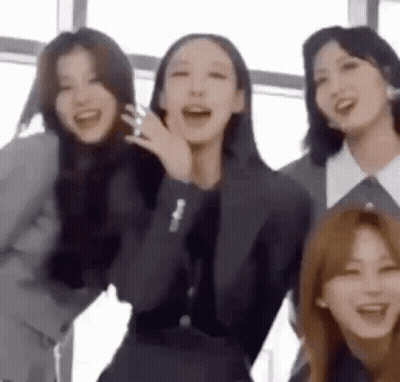 Young Women Laughing Together GIF