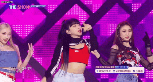 Young Women Performing On Stage GIF