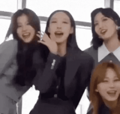 Young Women Posing And Laughing Together GIF