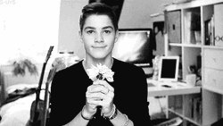 YouTuber Jack Harries Giving Flowers GIF
