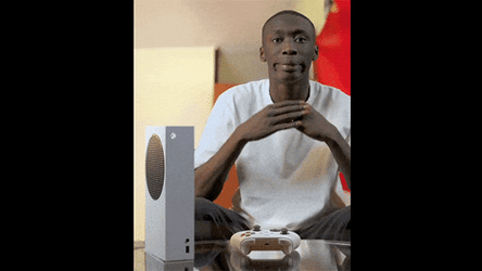 Youtuber Khaby Lame Showing Xbox GIF