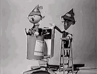 Yukon Cornelius Friend Hermey With Head Elf GIF
